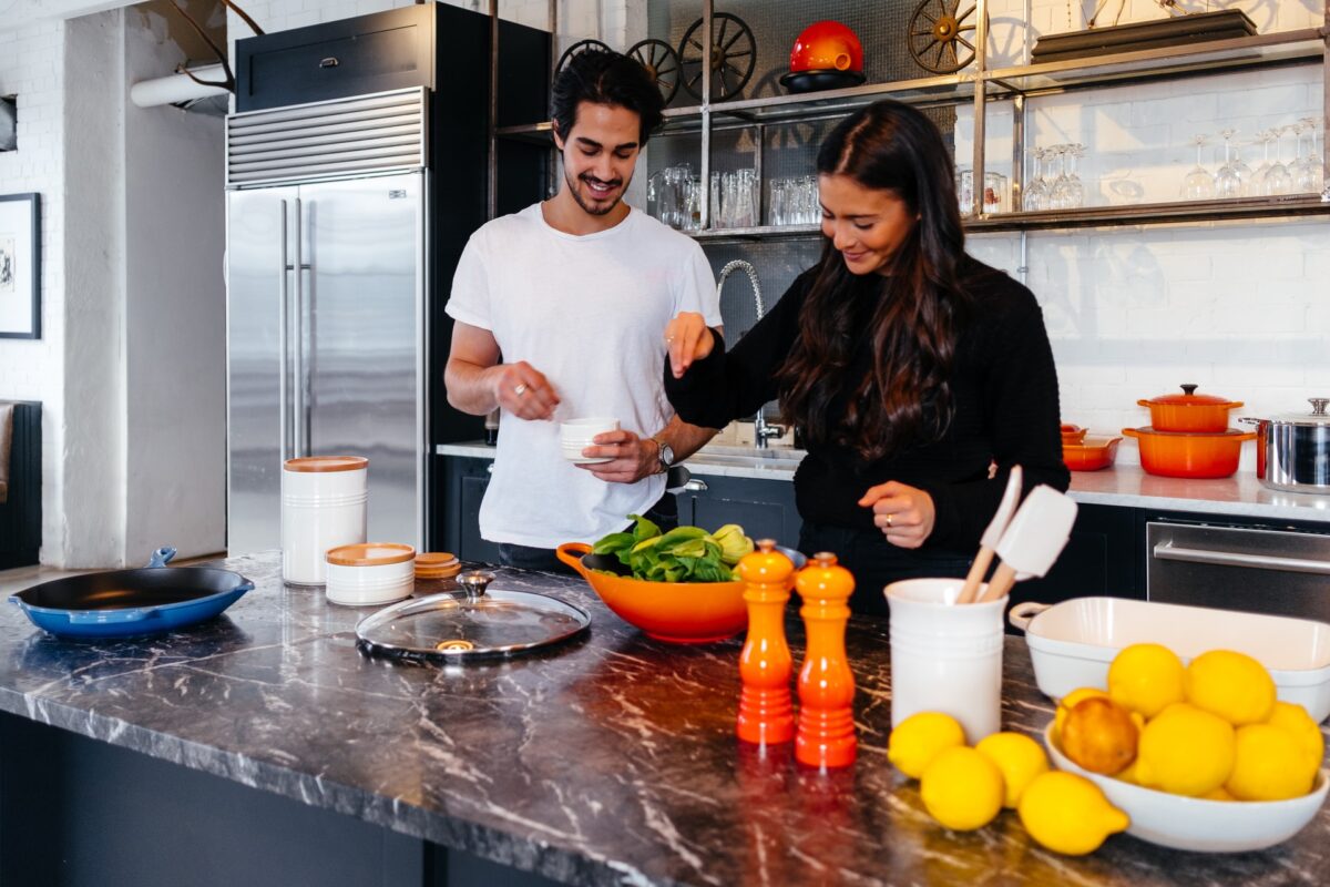 man-and-woman-doing-food-prep-in-the-kitchen-1200x800.jpg